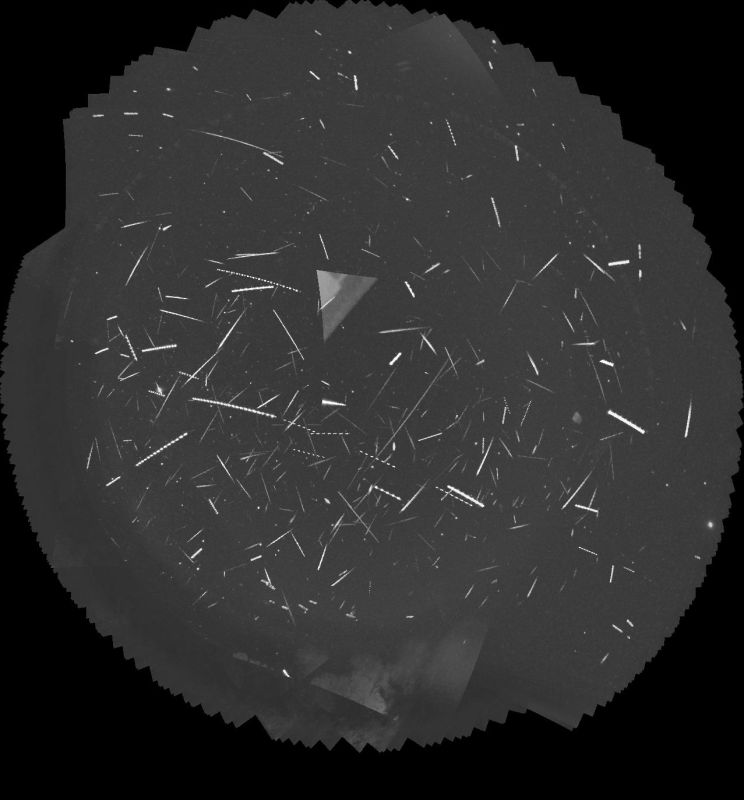 Meteor outburst, night of 14th-15th October 2023
This is a tracked stack of the meteors captured by my two Global Meteor Network cameras on the night of 14th to 15th October, 2023. One camera caught 162 meteors and the other caught 179. There's some field overlap, and some meteors get counted twice because of that, but the interesting thing about this outburst is that preliminary analysis assigned fewer than half the meteors to well-known showers. The Orionid, Southern Taurid and epsilon Geminid showers accounted for most of those assigned to showers, with the October Ursae Majorid, Leonis Minorid and chi Taurid showers picking up the rest, but the ones identified as sporadics outnumber them all. It will be interesting to see whether the multi-station orbit determinations done by GMN and UKmon pull some less well-known shower out of the data. 
