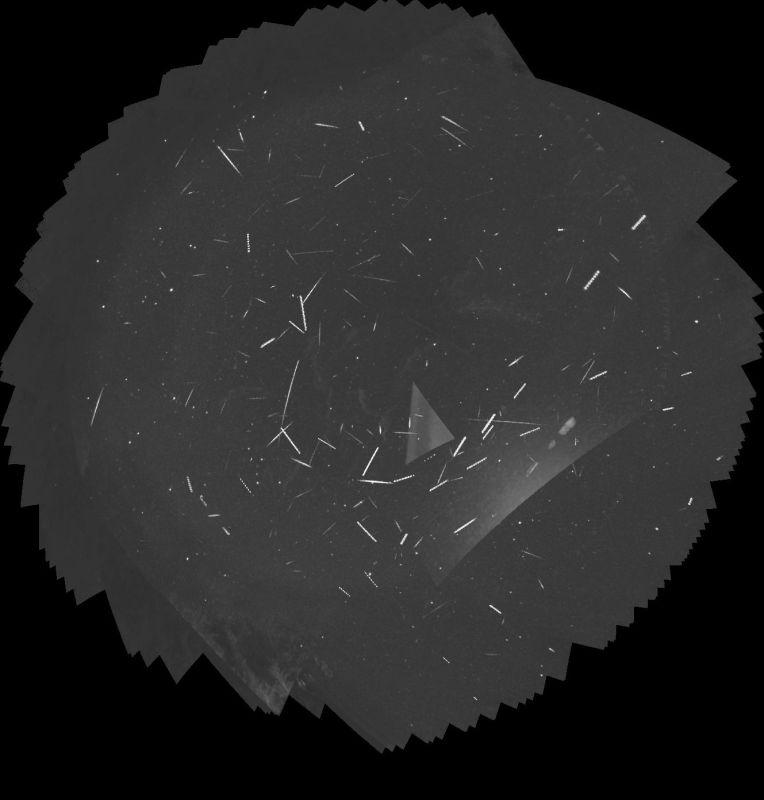 Sporadics, night of 3rd-4th January 2024
It's sporadic season, when there are no major meteor showers. This is a tracked stack of the meteors caught on the night of 2024 January 3rd to 4th by my Global Meteor Network cameras. It was a reasonably clear night, with nearly ten hours of clear sky. One camera caught 66 sporadic meteors, and the other caught 67. Neither camera caught any meteors from major showers because there are none at this time of year. However, the Global Meteor Network is capturing a lot of meteor data, and analysis of that data does occasionally lead to the identification of previously un-known meteor showers.
