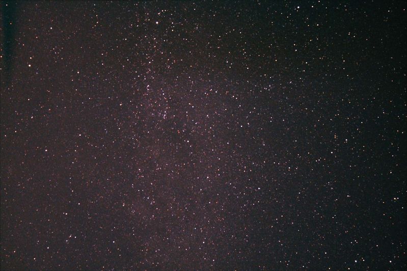 Cygnus widefield
My first foray into SLR Photography with an unmodified EOS 450D.  This is a widefield shot of Cygnus the Swan.  North is (approximately) at 1 o'clock and the three bright stars across the top of the image are the Swans wings (Gamma Cyg top center).

5 x 300s + 1 x 200s (no in camera noise reduction applied)

Link-words: Star