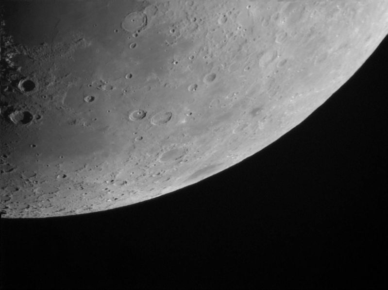 Moon 6 days old
A rather unusual shot as I've contrast stretched the shadowed area on the left so it's visible.  Through the eyepiece only the very top left rims of Aristoteles (larger of the two) and Eudoxus are visible as there's too much contrast for the eye. The processing has resulted on some noise that's especially visible in the dark areas on the left.

Stack of 10 subframes
Link-words: Moon