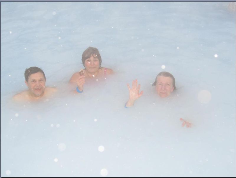 Close up in Lagoon 
Close up swimming in Blue Lagoon, with snow falling on us, eating and icecream, in water of 45 degrees.  Brian and Carole on left, 
also eating a ice Lolly with snow falling on our heads. 
Link-words: CarolePope Iceland2012