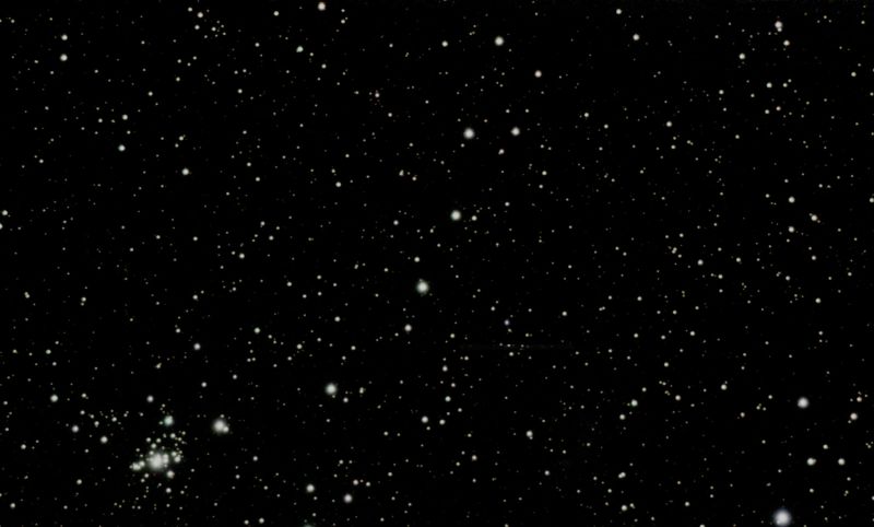 NGC 1502 and Kemble's Cascade
NGC 1502 is a small cluster of around 60 stars with a beautiful part ring of stars around the north west.  It lies at the bottom South East for Kemble's Cascade, part of which appears on the photograph
