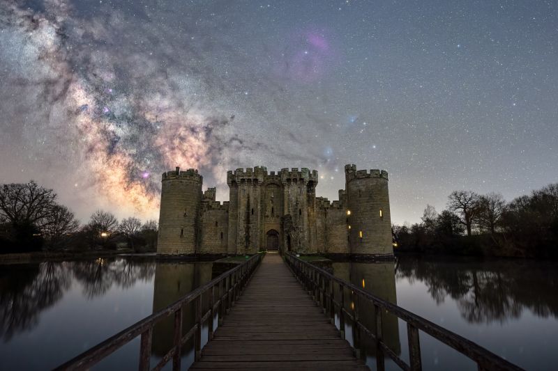 The dark horse rises
The Milky Way cascades down, as the dark horse nebula rises majestically over Bodiam Castle. 
