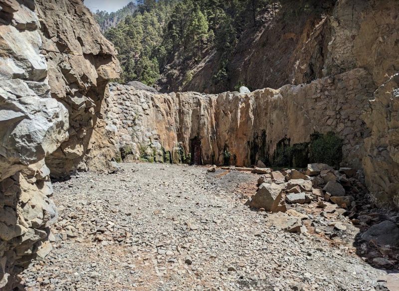 Cascada di colores - Taburiente Caldera 
This waterfall was disappointingly colourless as there had no rain for a year and the river bed was dry.  
Normally it is bright and multi-coloured 
Link-words: LaPalma2024