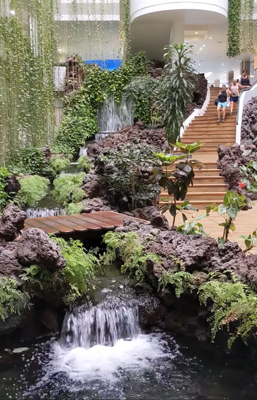 Central Lobby Waterfalls
H10 Taburiente Playe Hotel Los Cancajos La Palma
central lobby highly ornamented with plants, waterfalls and Fish 
Link-words: LaPalma2024