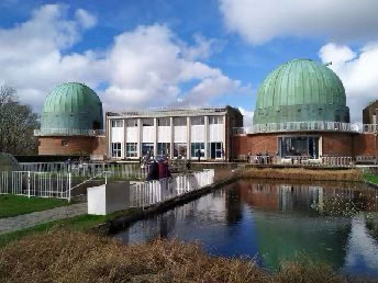 A view of some of the domes and ponds at the Herstmonceux Observatory Science Centre